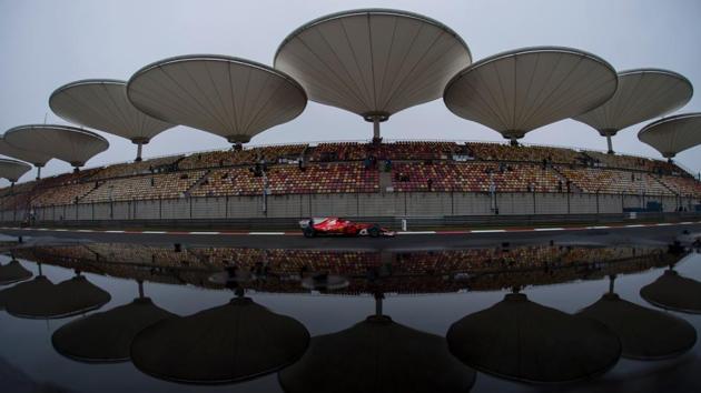 Ferrari's Finnish driver Kimi Raikkonen during the rain-affected first free practice session of the Formula One Chinese Grand Prix in Shanghai on Friday. Max Verstappen of Red Bull recorded the fastest time in first session that was also cut short with Lewis Hamilton and Sebastian Vettel unable to go out on track. (AFP) Ferrari's Finnish driver Kimi Raikkonen during the rain-affected first free practice session of the Formula One Chinese Grand Prix in Shanghai on Friday. Max Verstappen of Red Bull recorded the fastest time in first session that was also cut short with Lewis Hamilton and Sebastian Vettel unable to go out on track. (AFP)