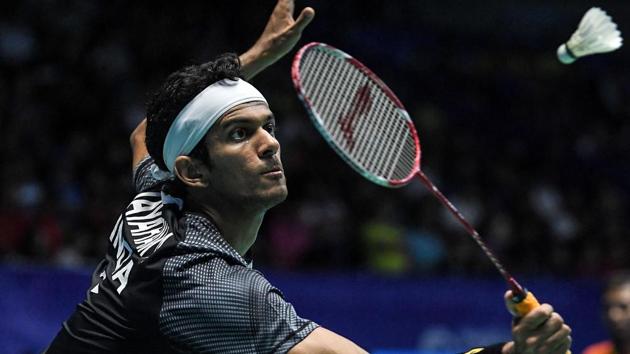 Ajay Jayaram hits a return against Son Wan-ho of South Korea during their men's singles quarterfinal match at the Malaysia Open Super Series badminton tournament in Kuching, Sarawak, on Friday.(AFP)