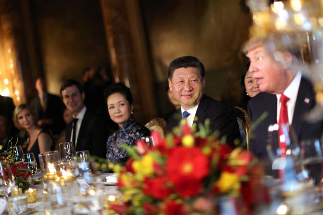 Chinese President Xi Jinping and First Lady Peng Liyuan attend a dinner hosted by U.S. President Donald Trump. On trade, U.S. labour leaders say Trump needs to take a direct, unambiguous tone in his talks with Xi. (Carlos Barria/REUTERS)