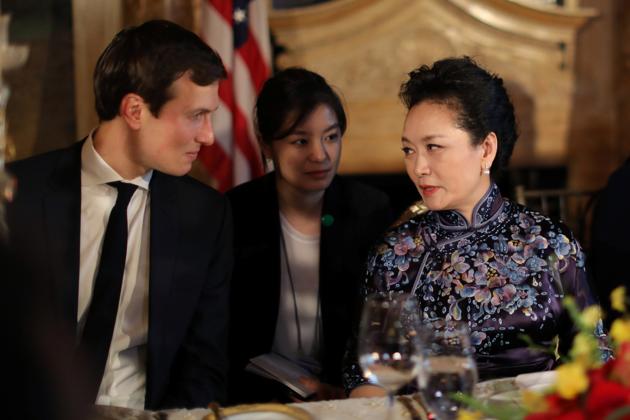 China's first lady Peng Liyuan talks with Trump Senior Advisor Jared Kushner as they attend a dinner at the start of a summit between U.S. President Donald Trump and Chinese President Xi Jinping. (Carlos Barria/REUTERS)