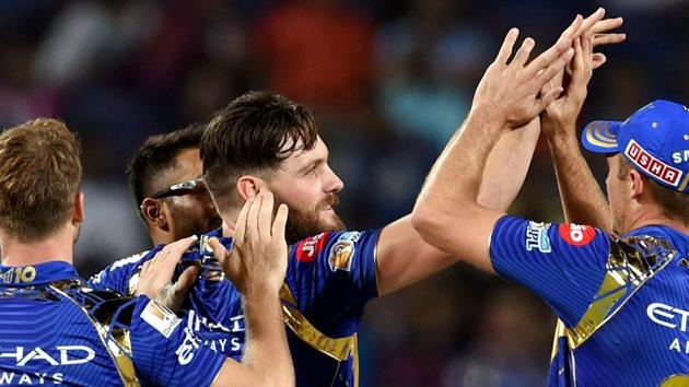 Mumbai Indians bowler Mitchell McClenaghan clelebrates the wicket of Rising Pune Supergiants batsman Mayank Agarwal. (PTI)