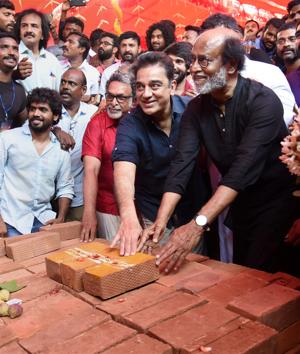 Tamil Super Stars Rajinikanth and Kamal Hassan during foundation stone laying ceremony of South Indian Film Artistes' Association building in Chennai on Friday.(PTI)