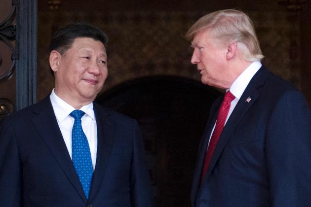 US President Donald Trump (R) and Chinese President Xi Jinping (L). (AFP File Photo) US President Donald Trump (R) and Chinese President Xi Jinping (L). (AFP File Photo)