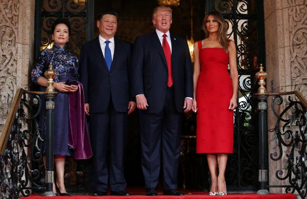 U.S. President Donald Trump and First Lady Melania Trump welcome Chinese President Xi Jinping and first lady Peng Liyuan. Trump has said he wants to raise concerns about China’s trade practices and urge Xi to do more to rein in North Korea’s nuclear ambitions during his first talks with the Chinese leaders, though no major deals on either issue were expected. (Carlos Barria/REUTERS)