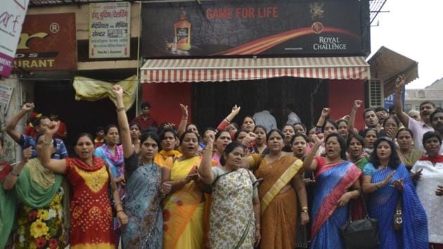 Residents of Vaishali area of Ghaziabad are seen staging a protest against the permission issued to open a liquor shop in their locality a few years ago. (HT File Photo) Residents of Vaishali area of Ghaziabad are seen staging a protest against the permission issued to open a liquor shop in their locality a few years ago. (HT File Photo)