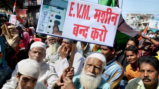 Congress party activists demonstrate in Bhopal against the use of EVMs in the bypolls. (PTI) Congress party activists demonstrate in Bhopal against the use of EVMs in the bypolls. (PTI)