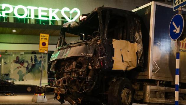 A destroyed truck is pulled away by a service car after it was driven into a department store in Stockholm, Sweden. The hijacked beer truck plowed into pedestrians at the central Stockholm department store on Friday, sending screaming shoppers fleeing in panic in what Sweden's prime minister called a terrorist attack. (AP Photo) A destroyed truck is pulled away by a service car after it was driven into a department store in Stockholm, Sweden. The hijacked beer truck plowed into pedestrians at the central Stockholm department store on Friday, sending screaming shoppers fleeing in panic in what Sweden's prime minister called a terrorist attack. (AP Photo)