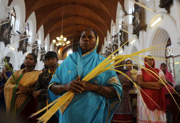 Indian Christian worshippers take part in a Palm Sunday Mass in Chennai on April 9, 2017. Palm Sunday marks the sixth and last Sunday of Lent and the beginning of Holy Week. (ARUN SANKAR / AFP)