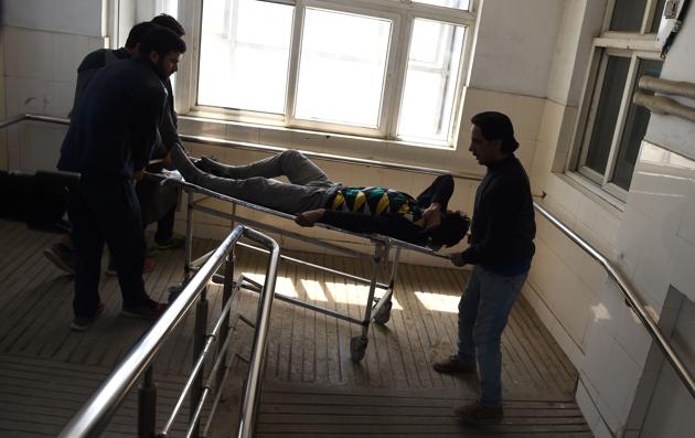 Hundreds of protesters charged into voting booths in the Budgam district . Five civilians were killed when security forces opened fire at a crowd of protestors allegedly throwing stones at troops engaged in a counter-insurgency raid. (Tauseef MUS)