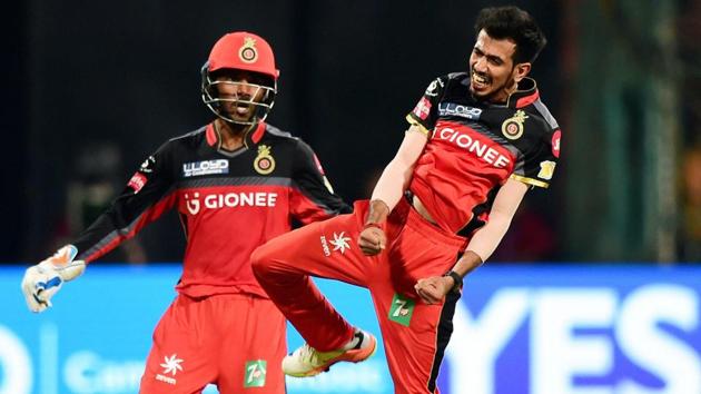 Yuzvendra Chahal celebrates the wicket of Carlos Brathwaite with team mates. (PTI)