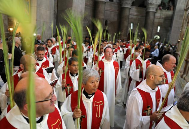 Palm Sunday is also known as Fig Sunday because tradition maintains that Jesus cursed a fig tree that would not bear fruit, and ate figs after his entry into Jerusalem. Dried figs are often eaten on the day. (Ammar Awad / REUTERS)