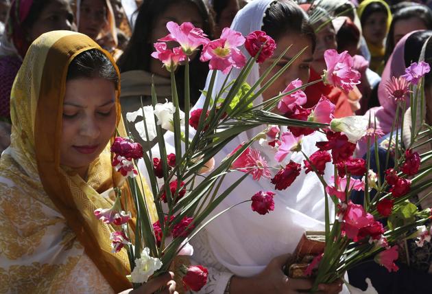 Pakistani Christian women pray during a Palm Sunday mass in St. Anthony church in Lahore, Pakistan. (K.M. Chaudary / AP)