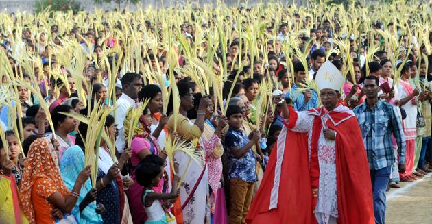 Catholics attends the special mass on 'Palm Sunday' at St John's school ground in Ranchi, India. (Diwakar Prasad/ Hindustan Times)