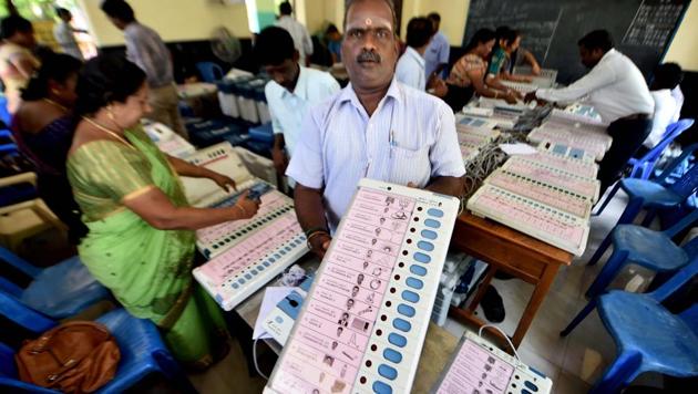 Workers readying EVMs for RK Nagar constituency bypolls in Chennai.(PTI File Photo)