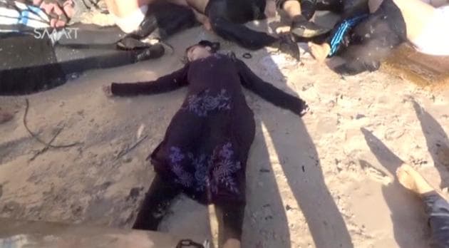 People lying on the ground, said to be in the town of Khan Sheikhoun, after what rescue workers described as a suspected gas attack in rebel-held Idlib, Syria (Social Media Website / REUTERS)