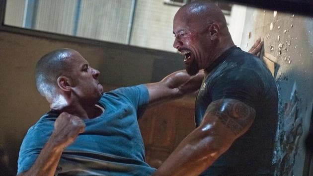 vin diesel as dwayne johnson flexing and yelling let's