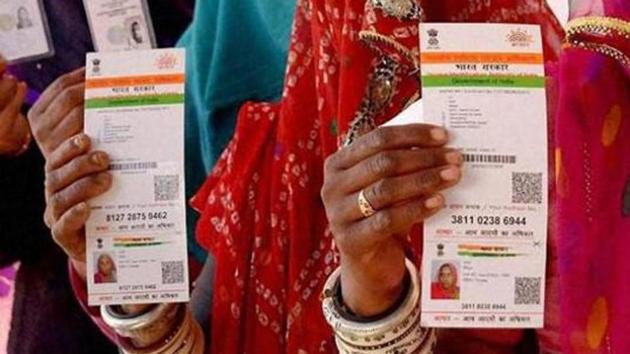 Women showing their Aadhaar cards in Rajasthan.(PTI File Photo)