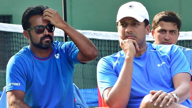 Mahesh Bhupathi (R) and Leander Paes look on during the Davis Cup tie between India and Uzbekistan. (PTI) Mahesh Bhupathi (R) and Leander Paes look on during the Davis Cup tie between India and Uzbekistan. (PTI)