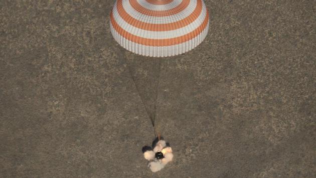he Russian Soyuz capsule carrying the International Space Station’s Expedition 50 crew lands safely in the steppes of Kazakhstan. (Kirill Kudryavtsev/Pool / AFP)