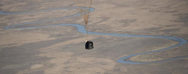 This NASA handout photo shows the Soyuz MS-02 spacecraft as it lands with Expedition 50 Commander Shane Kimbrough of NASA and Flight Engineers Sergey Ryzhikov and Andrey Borisenko of Roscosmos near the town of Zhezkazgan. They have spent 173 days in space during their flight. (Bill Ingalls/NASA / AFP)