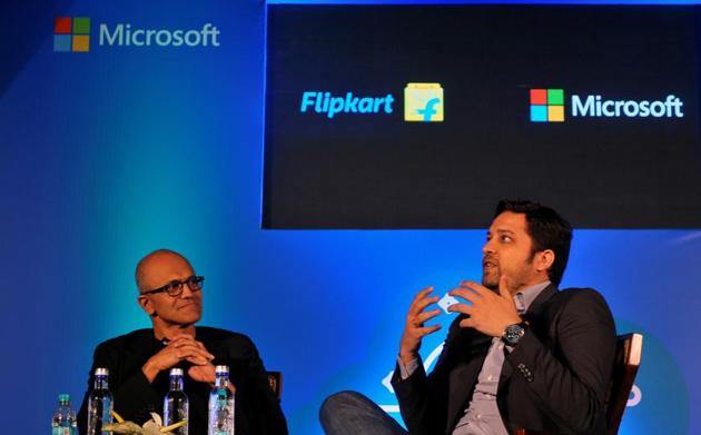 Microsoft Chief Executive Officer Satya Nadella and Flipkart Group CEO and co-founder Binny Bansal attend a news conference in Bengaluru.(REUTERS)