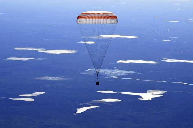 Russia's Soyuz MS-02 space capsule carrying the International Space Station (ISS) crew members, NASA astronaut Shane Kimbrough and cosmonauts Sergey Ryzhikov and Andrey Borisenko of the Russian space agency Roscosmos, descends before landing in a remote area outside the town of Dzhezkazgan (Zhezkazgan), Kazakhstan. (/Kirill Kudryavtsev/Pool /REUTERS)