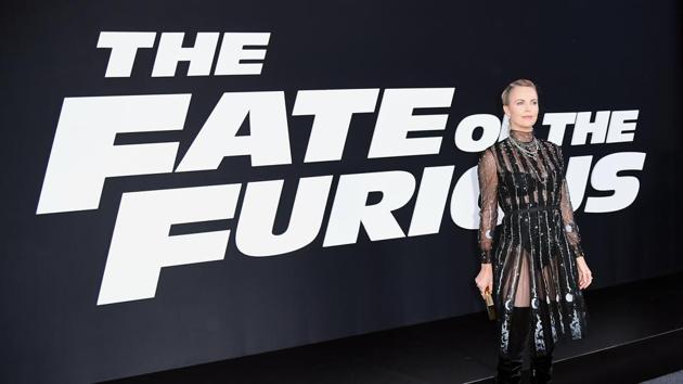 Actor Charlize Theron, who plays the villain in Universal Pictures' The Fate Of The Furious, poses at the Radio City Music Hall premiere. (AFP)