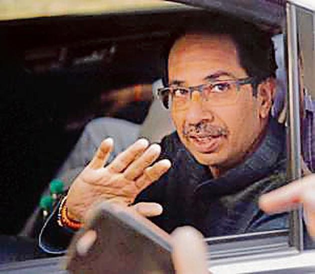 Ahiv Sena chief Uddhav Thackeray leaves party MP Sanjay Raut's residence for the National Democratic Alliance meeting in New Delhi on Monday.(PTI)