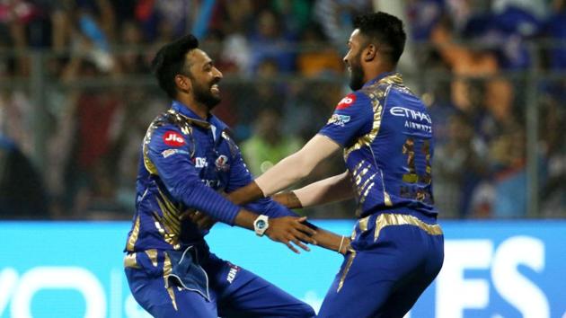 Mumbai Indians’ brother duo of Krunal Pandya (left) and Hardik Pandya played stellar roles in their four-wicket victory against Kolkata Knight Riders in their 2017 Indian Premier League match at Wankhede Stadium in Mumbai on Sunday. Get full cricket score of Mumbai Indians vs Kolkata Knight Riders here.(BCCI)