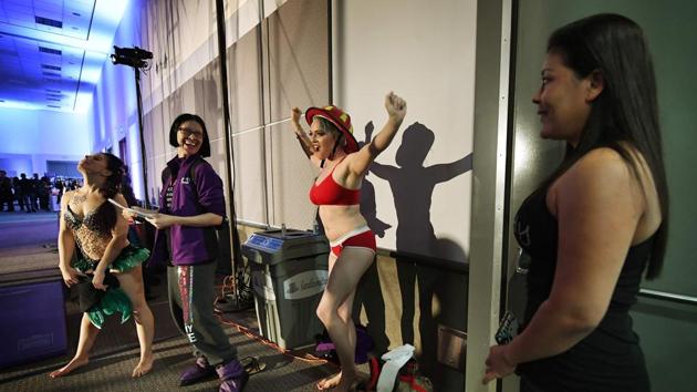 Ishtar Sunday (C) waits to compete in the Championships. (Mark RALSTON / AFP)