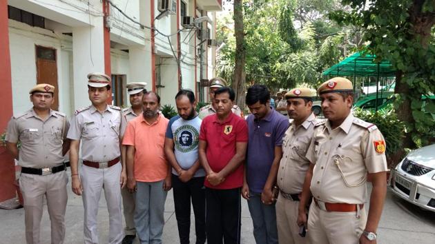 The accused in police custody.(Handout) The accused in police custody.(Handout)