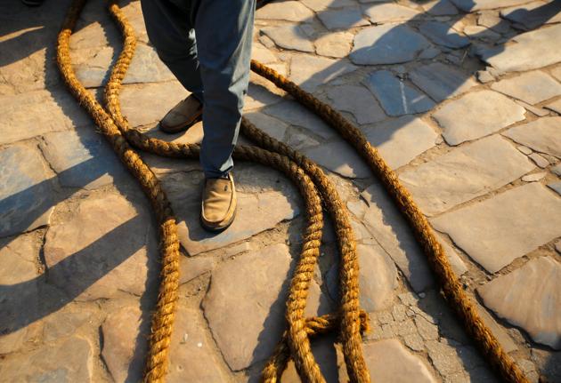 Ropes tied on the chariot of God Bhairab lie on the ground. (Navesh Chitrakar/REUTERS)