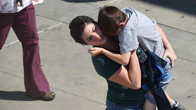 Burguan had earlier said they were being transported to nearby Cajon high school. (Robyn Beck/AFP) Burguan had earlier said they were being transported to nearby Cajon high school. (Robyn Beck/AFP)