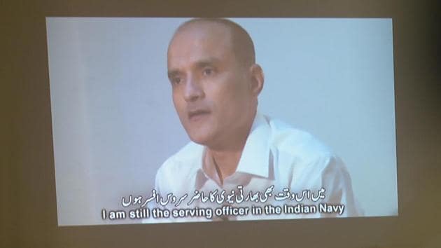In this file photo, journalists look at an image of former Indian naval officer Kulbhushan Jadhav, who was arrested in March 2016, during a press conference by Pakistan’s army spokesman and the information minister, in Islamabad. (AFP) In this file photo, journalists look at an image of former Indian naval officer Kulbhushan Jadhav, who was arrested in March 2016, during a press conference by Pakistan’s army spokesman and the information minister, in Islamabad. (AFP)