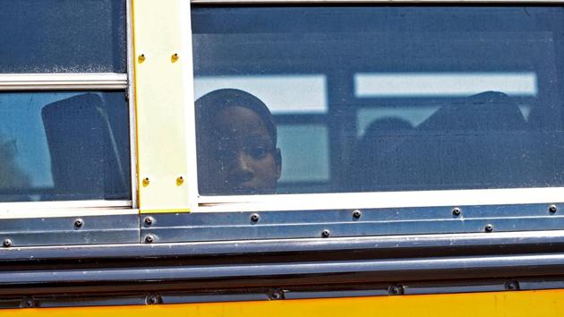The two children were standing behind Smith when they were struck by gunfire. Authorities did not name the surviving student. (Mario Anzuoni/REUTERS) The two children were standing behind Smith when they were struck by gunfire. Authorities did not name the surviving student. (Mario Anzuoni/REUTERS)