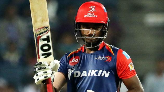 Sanju Samson of Delhi Daredevil raises his bat after scoring his century against Rising Pune Supergiant.(BCCI)