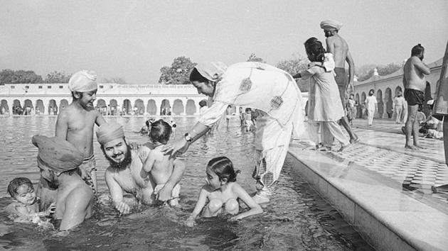 Marking the beginning of the solar new year, a Sikh family takes a holy dip on the occasion of Baisakhi at Bangla Sahib Gurudwara. One of the most popular festivals, Baisakhi has a special significance for Sikhs as on this day in 1699, the tenth guru, Guru Gobind Singh Ji formed the order of the Khalsa. The festival widely celebrated in many northern states of India such as Haryana, Himachal Pradesh and Uttarakhand also coincides with other new year festivals celebrated across the southern states. (HT Photo)