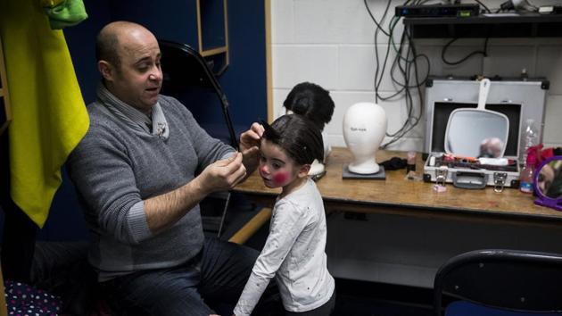 Davis Vassallo and his daughter Adriana prepare to perform with the Ringling Bros. and Barnum & Bailey circus. (Doug Mills / NYT) Davis Vassallo and his daughter Adriana prepare to perform with the Ringling Bros. and Barnum & Bailey circus. (Doug Mills / NYT)