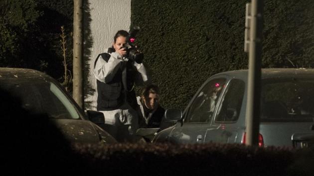 Police officers investigate at the scene following an explosion near a bus carrying the Borussia Dortmund football team, in Dortmund on Tuesday. The first leg of the Champions League quarterfinal match between Borussia Dortmund and AS Monaco has been postponed after the bus carrying the Dortmund squad was damaged in an explosion, and team player Marc Bartra was hospitalised. (AP) Police officers investigate at the scene following an explosion near a bus carrying the Borussia Dortmund football team, in Dortmund on Tuesday. The first leg of the Champions League quarterfinal match between Borussia Dortmund and AS Monaco has been postponed after the bus carrying the Dortmund squad was damaged in an explosion, and team player Marc Bartra was hospitalised. (AP)