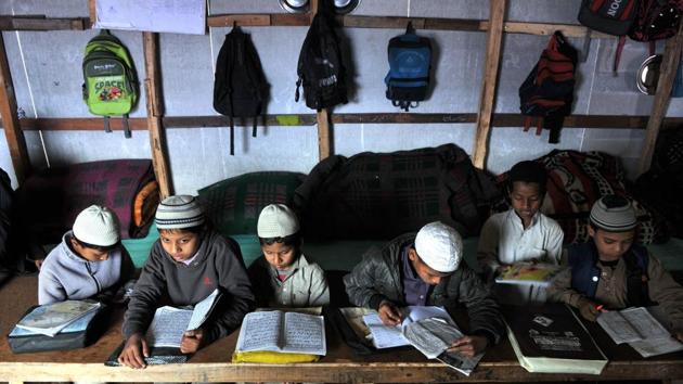 Rohingya Muslim children busy in their studies in Madrasa at a refugee camp. Following criticism, the chamber claimed that its statement was “misconstrued by anti-national elements and all it wanted was to kill the issue”. (Nitin Kanotra/HT Photo)