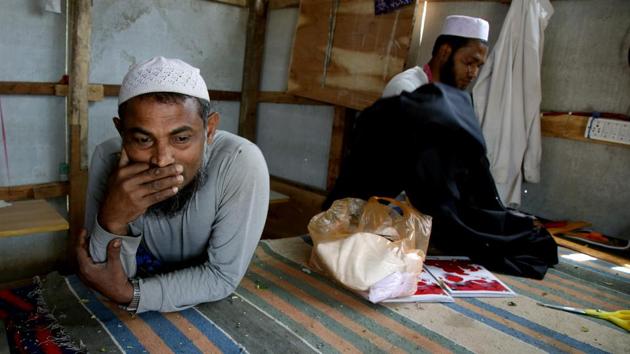 Rohingya Muslims work at a refugee camp. Jammu’s geographical proximity to Pakistan is seen as a convenient transit route. (Nitin Kanotra/HT Photo)