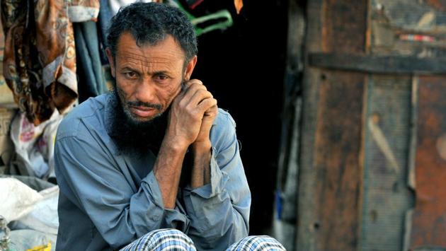 A Rohingya Muslim sitting outside his temporary shed at a refugee camp. Pro-Jammu outfits see their settlement as a sinister design to alter the demography of the Hindu-dominated region. (Nitin Kanotra/HT Photo)