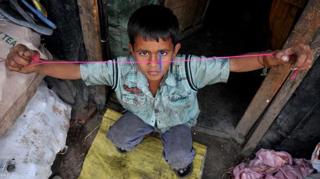 A Rohingya Muslim child playing at a refugee camp. Union home minister Rajnath Singh has sought a report from the state government over the influx of the illegal immigrants from Myanmar and Bangladesh to Jammu. (Nitin Kanotra/HT Photo)