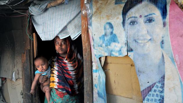 A Rohingya Muslim woman seen along with her child at a refugee camp. The state and central governments are exploring ways to deport Rohingya Muslims from the state. (Nitin Kanotra/HT Photo)