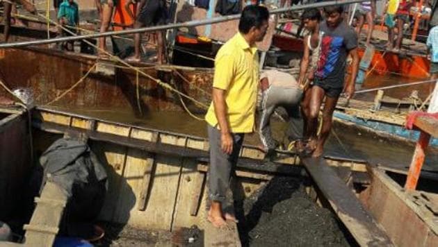 One of the boats carrying sand that was illegally mined along a 12-km stretch in Thane. (HT file photo) One of the boats carrying sand that was illegally mined along a 12-km stretch in Thane. (HT file photo)