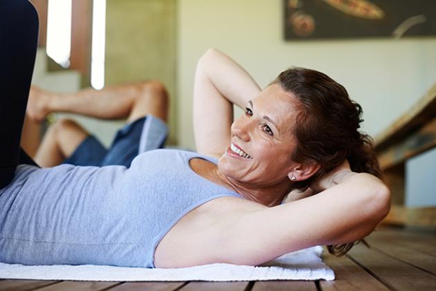 Strength training exercises working core strength and the thighs help build muscle mass in menopausal women.(Istock)