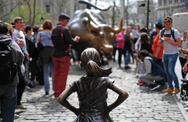 The Fearless Girl and the Charging Bull statue son New York’s Wall Street.(AFP)