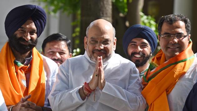 Rajouri Garden bypoll winner Manjinder Singh Sirsa (left) along with BJP national president Amit Shah in New Delhi on Thursday. (Arun Sharma/HT Photo) Rajouri Garden bypoll winner Manjinder Singh Sirsa (left) along with BJP national president Amit Shah in New Delhi on Thursday. (Arun Sharma/HT Photo)