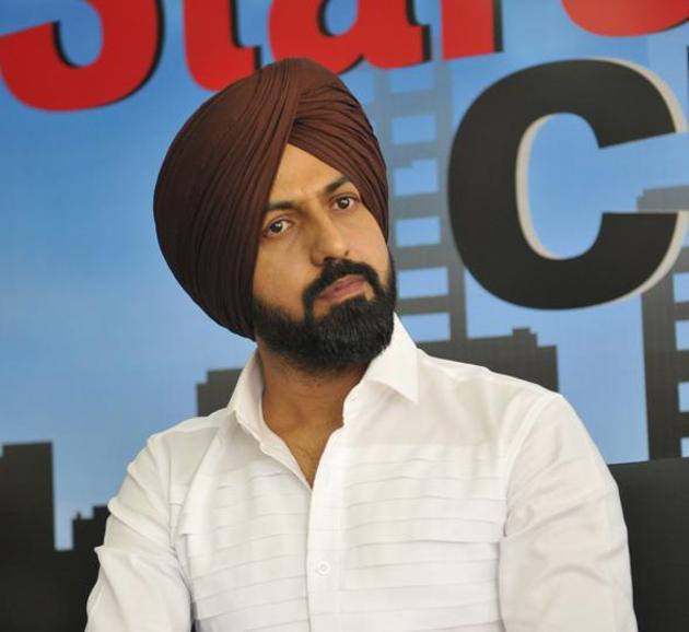 Actor Gippy Grewal at the HT office in SAS Nagar on Thursday, the eve of his latest release ‘Manjey Bistrey’. (Keshav Singh/HT)