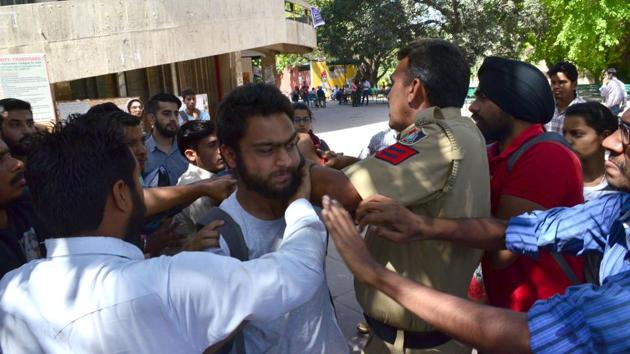 Police arresting students from Student Centre on the Panjab University campus on Wednesday. (Anil Dayal/HT Photo) Police arresting students from Student Centre on the Panjab University campus on Wednesday. (Anil Dayal/HT Photo)